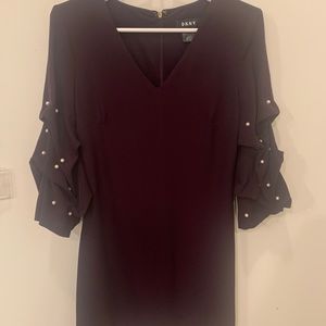 Trendy dress, dark purple with pearls on it